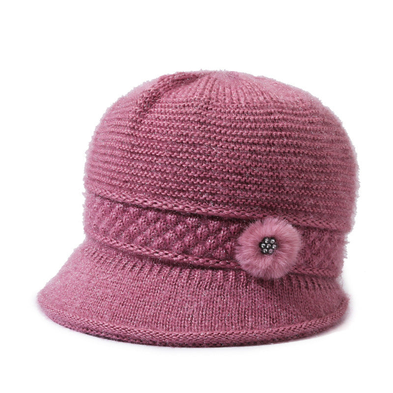 女性用冬用暖かいフリース帽子、ニット素材で作られています