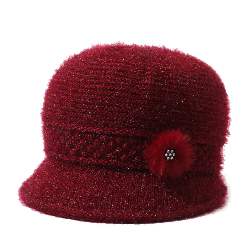 女性用冬用暖かいフリース帽子、ニット素材で作られています